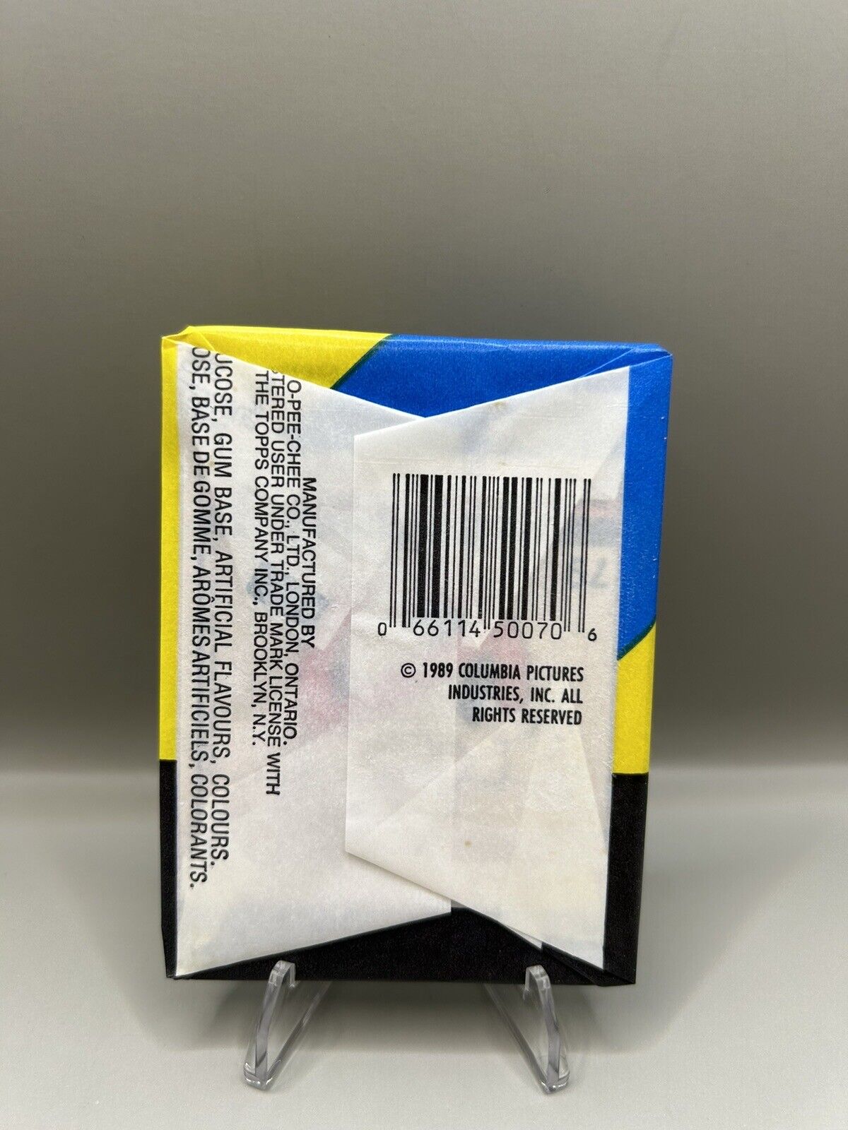 Sealed 1989 Ghostbusters II trading card wax pack by O-Pee-Chee, containing 5 cards, 1 sticker, and 1 stick of bubble gum, featuring movie scenes. Back of pack