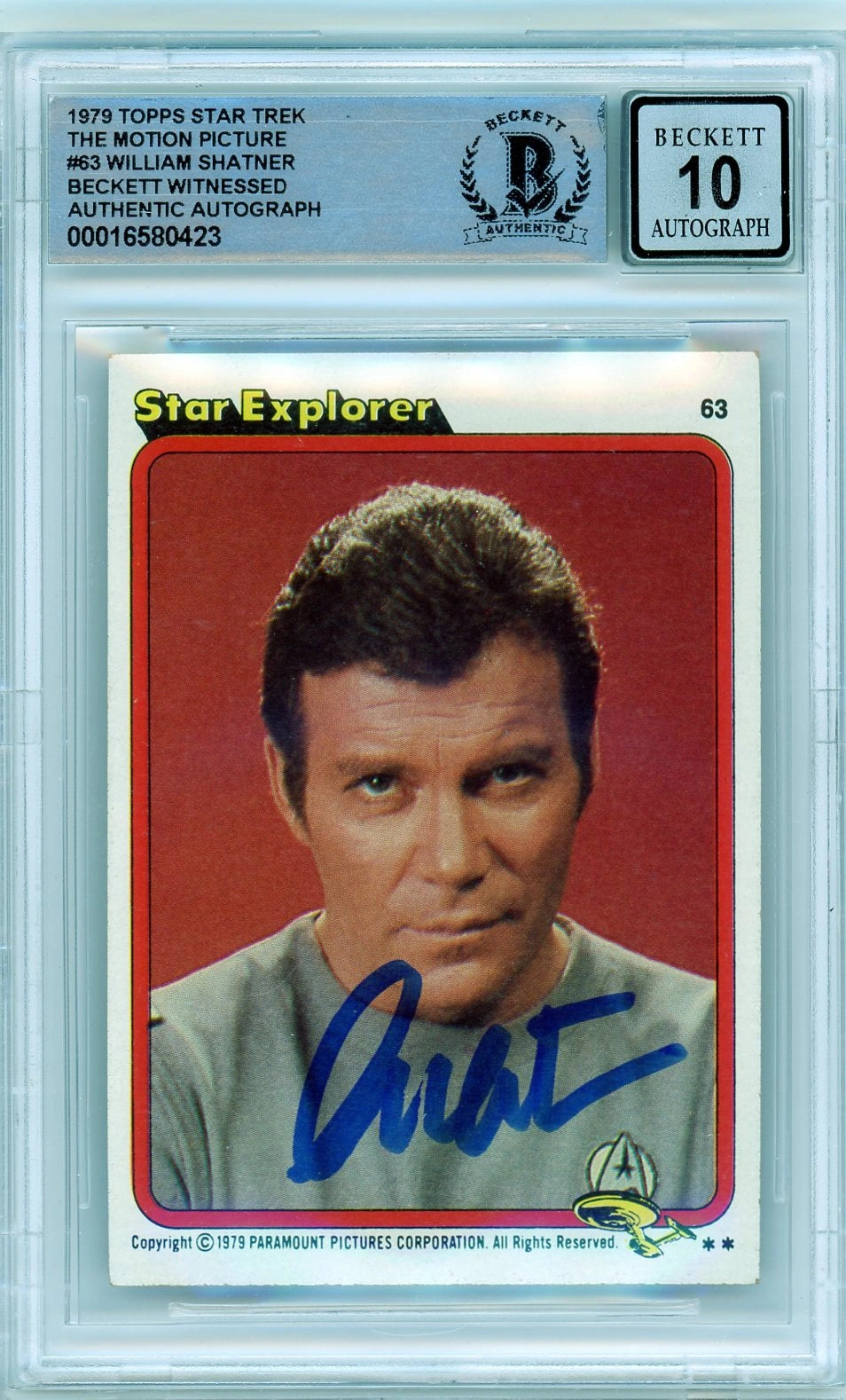 Front of 1979 Topps Star Trek The Motion Picture trading card #63 featuring William Shatner as Captain Kirk, signed in bold blue ink, encapsulated by Beckett with Autograph Grade 10.