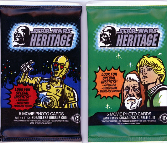 2004 Sealed Star Wars Heritage trading card packs featuring artwork of C-3PO and Luke Skywalker with Obi-Wan Kenobi, containing 5 movie photo cards and special inserts