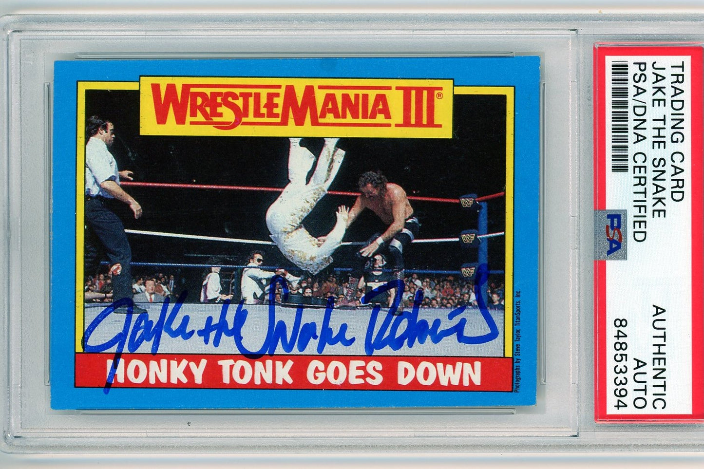 WrestleMania III trading card titled 'Honky Tonk Goes Down,' autographed by Jake 'The Snake' Roberts, PSA/DNA Certified